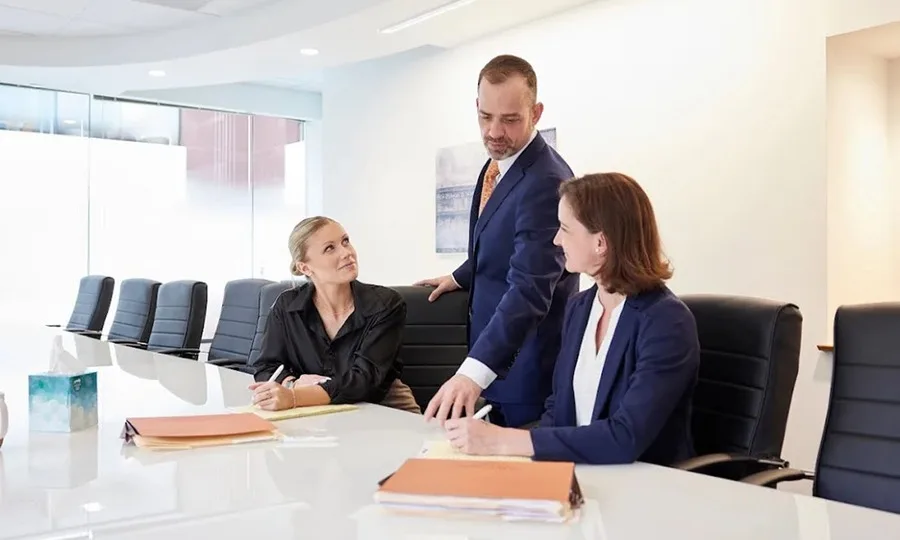 Callahan | Inman attorneys meeting with clients